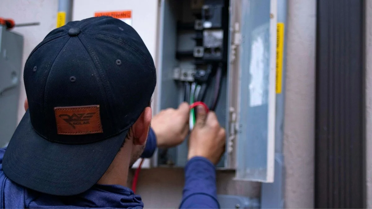 HVAC technician repairing a furnace system in a residential property in Tucson, Arizona