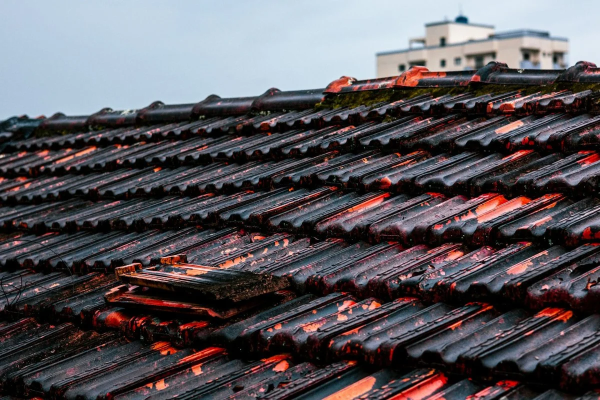 Tile roof with visible storm damage on a residential home in Tucson, Arizona