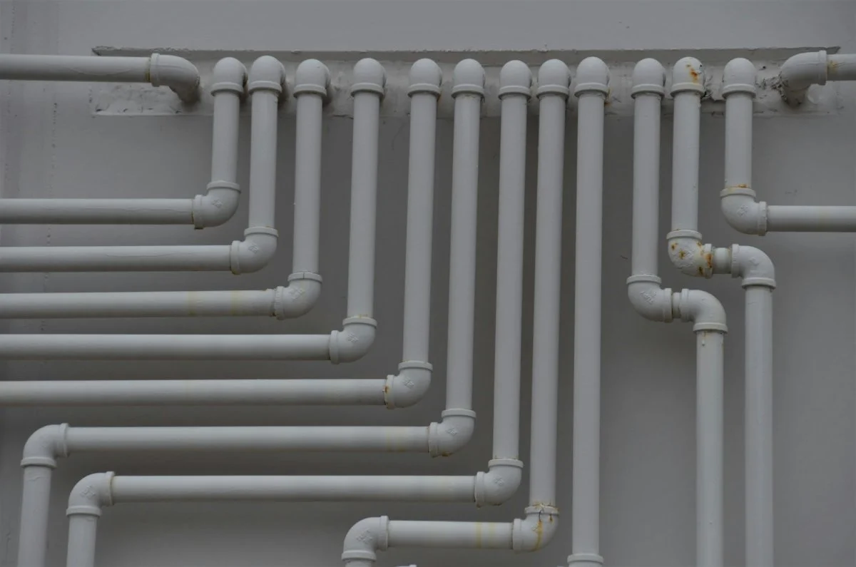Network of plumbing pipes inside a residential system in Tucson, Arizona